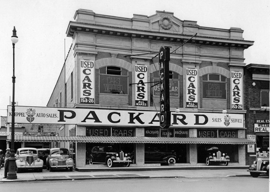 Koeppel Auto Sales, a Packard and used car dealership. Jamaica, Long Island, New York; photo circa 1940.