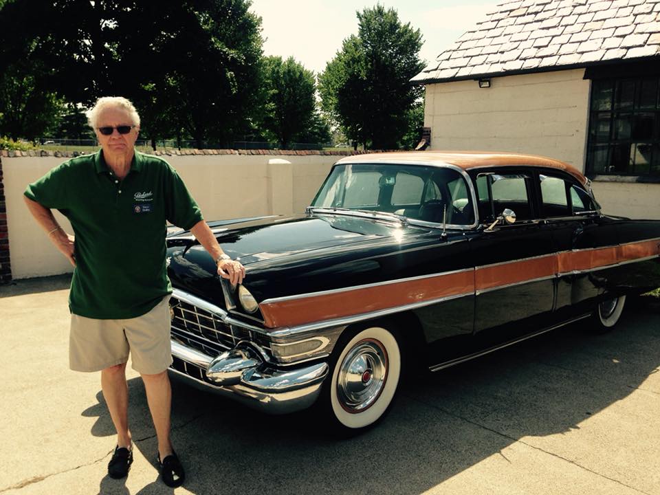 A Packard Proving grounds Volunteer in his green Packard Polo in front of his 1956 Packard Executive Sedan at the PPG