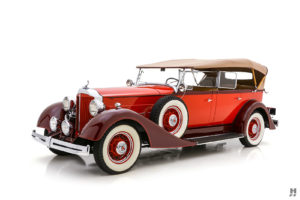 A red 1934 Packard 1101 Dural-Cowl Seven-Passenger Touring