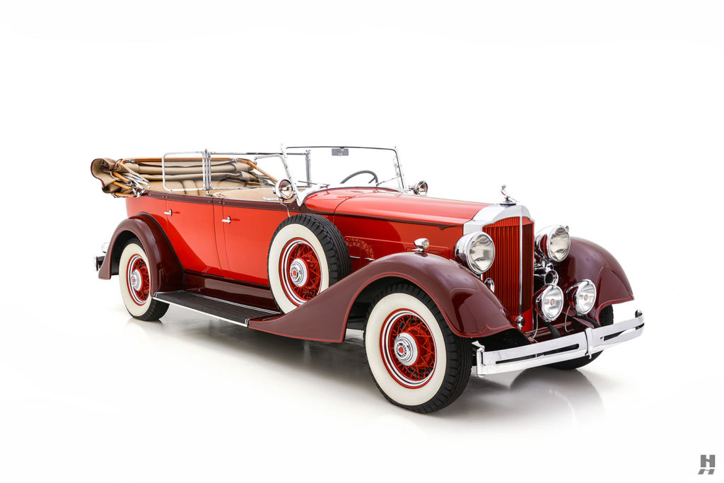 red 1934 Packard 1101 Dual-Cowl Seven-Passenger Touring with the top down